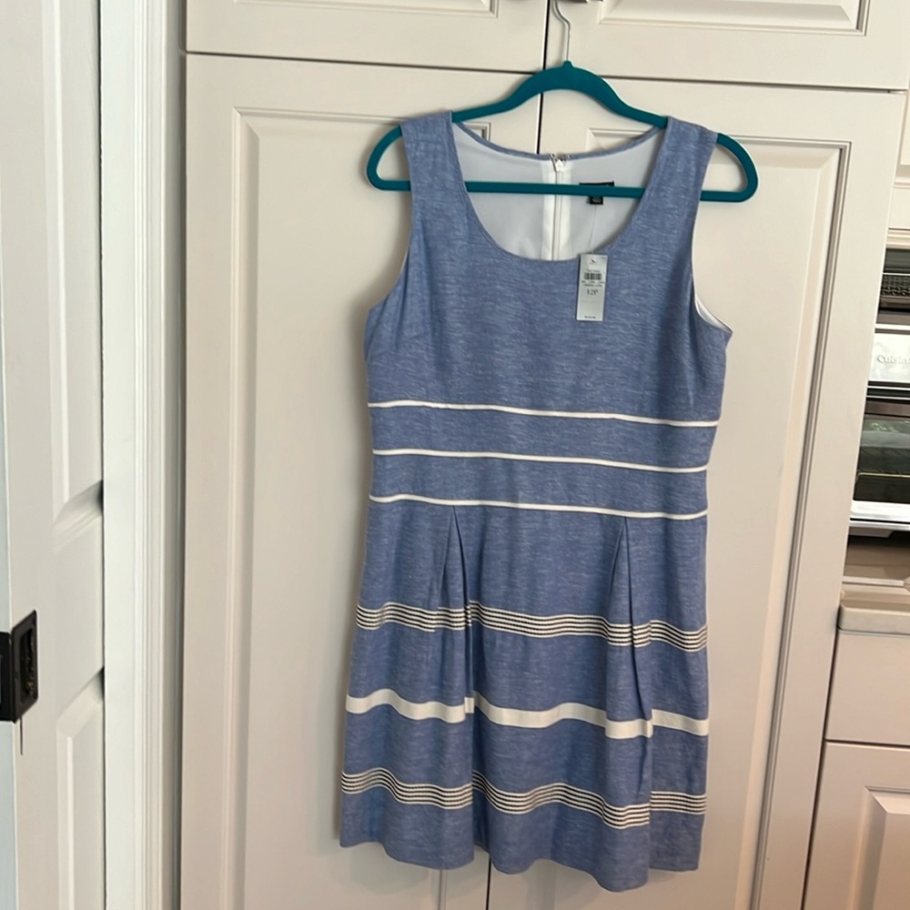 Ann Taylor blue dress with stripes 12 P NWT call tags are attached sleeveless.